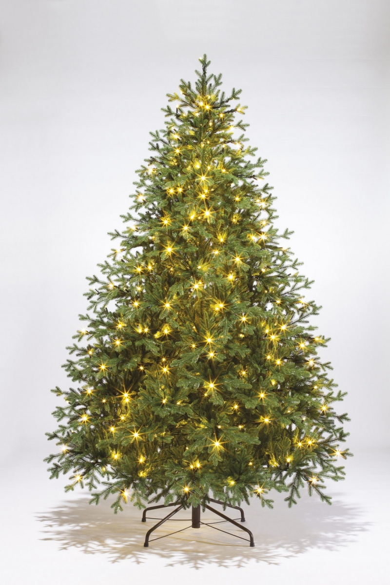 Искусственная елка «Вега с освещением» изготовлена из литого полимера, не имеет неприятного запаха, проста в сборке и разборке.